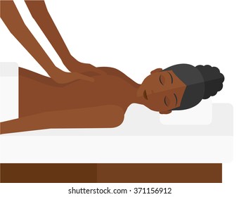 Woman recieving massage.