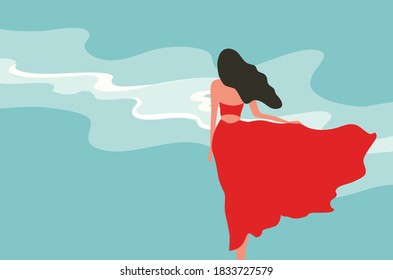 Woman in red dress standing on the beach summer background