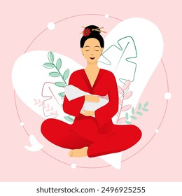 Woman in red kimono in lotus pose is holding a baby with tenderness on pink floral background