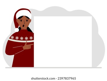 A woman in a red sweater near a large white sheet. Advertising, invitation, discount for Christmas or New Year.