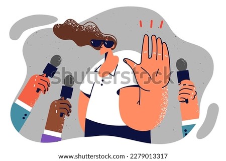 Woman refusing to give comments to journalists and reporter holding out hands with microphone for interview. Celebrity girl or politician is trying to drive away journalists demanding interview 