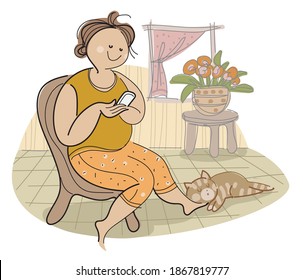 A woman is relaxing with cellphone and a cat