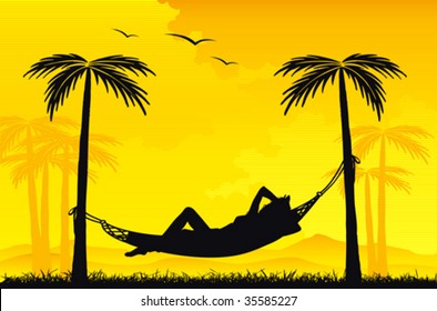 Woman relaxing in a hammock on tropical background