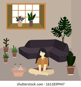 a woman is relaxing at home decorated with plants