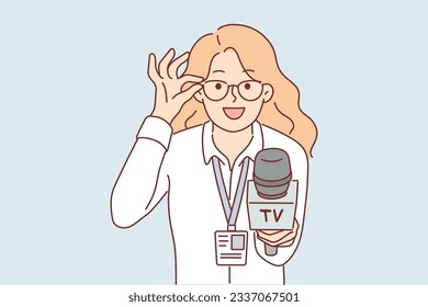 Woman reporter with microphone adjusts glasses and interviews politician or manager of large corporation. Girl holds out microphone to screen while filming report for tv show with expert opinion