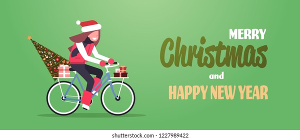 woman riding bike with fir tree gift box merry christmas happy new year concept flat horizontal vector illustration