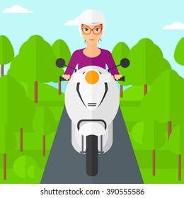 Woman riding scooter.