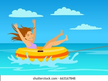 woman riding tube at the beach. extreme summer vacation holidays sport fun activity