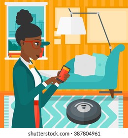 Woman with robot vacuum cleaner.