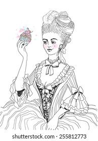 Woman in rococo style dress with a cupcake