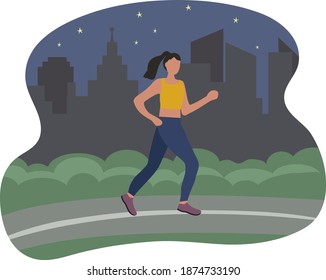 A woman running in the city at night. Sports training on the street. A runner on the move. Marathon and long runs in the street. running and fitness every day. comfortable athletic clothing 