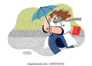 Woman runs with sunshade in hands during storm and tries to escape downpour on way to work. Unfortunate girl fell under downpour and risks getting wet or becoming victim of lightning