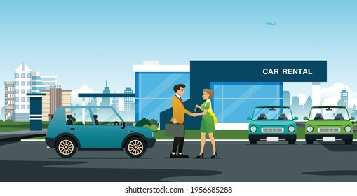 A woman salesman shakes hands to congratulate businessmen who have rented a car.