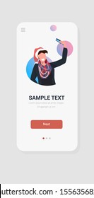 woman in santa claus hat taking selfie photo with cellphone camera merry christmas happy new year winter holidays celebration concept smartphone screen online mobile app portrait sketch vertical