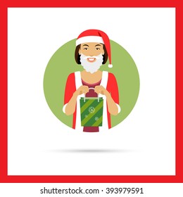 Woman in Santa costume, holding gift bag