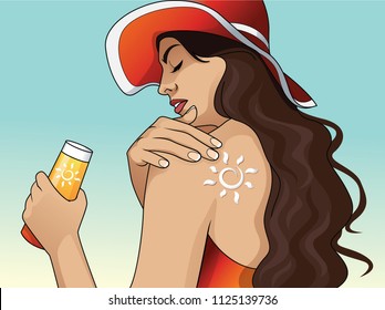 Woman sat on the beach applying sun cream