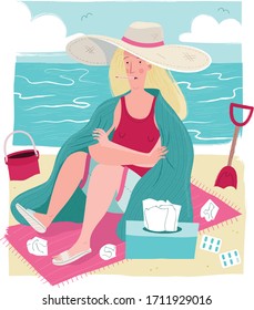 A woman sat on a beach looking ill, surrounded by tissues