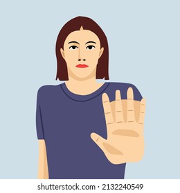 a woman saying no with her hand with blue background, fed up with bullying, asking to stop