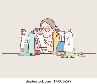 Woman scans the composition of Detergent. Hand drawn style vector design illustrations.