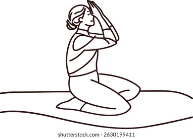 Woman in a seated prayer pose practicing yoga and mindfulness for meditation