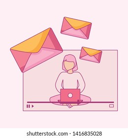 woman seated using laptop computer with envelopes