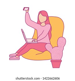 woman seated using laptop computer