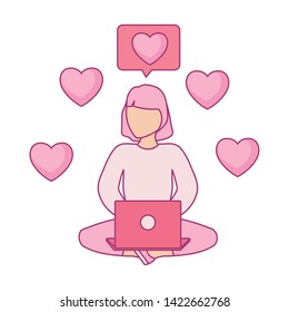 woman seated using laptop computer with hearts