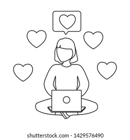 woman seated using laptop computer with hearts