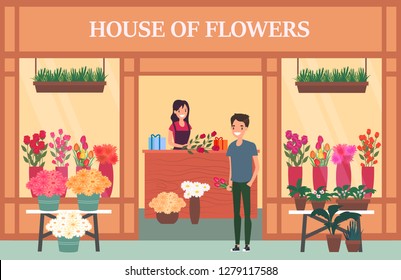 Woman seller at flower shop with bouquet