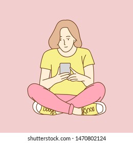 Woman sending text message and sms with smartphone. Finger typing with cellphone keyboard. 