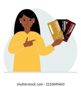 A woman with several plastic cards. The concept of multiple loans, the burden of credit cards and banking fees over a lifetime.