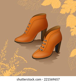 Woman shoes on autumn background 