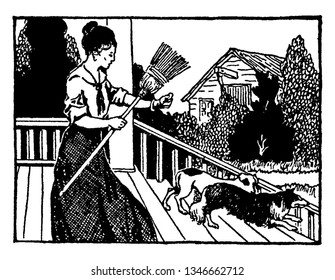 A woman shooing dogs away with a broom, vintage line drawing or engraving illustration