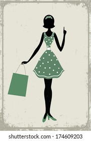 Woman with shopping bag and with her finger up. 