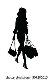 Woman with shopping bags silhouette