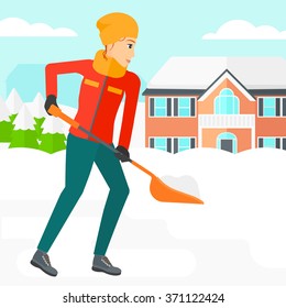 Woman shoveling and removing snow.