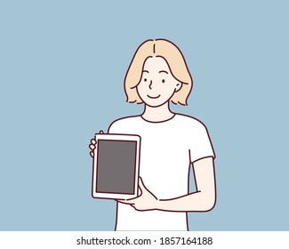 Woman showing blank no-name tablet pc monito. Hand drawn style vector design illustrations.