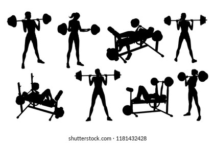 A Woman In Silhouette Using Pieces Of Gym Fitness Equipment And Machines Set