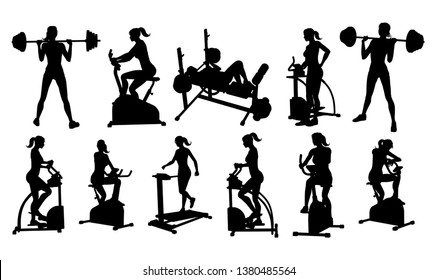 A woman in silhouette using pieces of gym fitness equipment and machines set