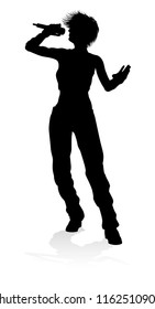 A woman singer pop, country music, rock star or even hiphop rapper artist vocalist singing in silhouette