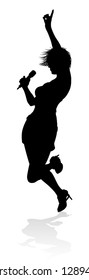 A woman singer pop, country music, rock star or even hiphop rapper artist vocalist singing in silhouette