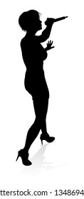 A woman singer pop, country music, rock star or even hiphop rapper artist vocalist singing in silhouette