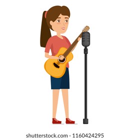 woman singing with microphone and playing guitar
