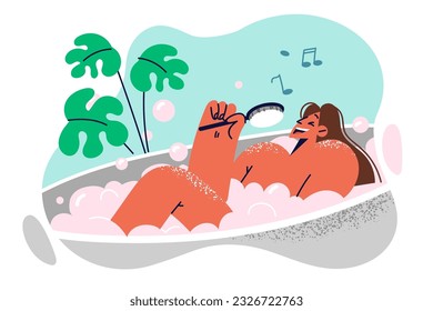 Woman sings lying in bath and relaxing during home SPA treatments after hard day work. Young happy girl enjoying bubble bath and using brush instead of microphone to sing favorite songs