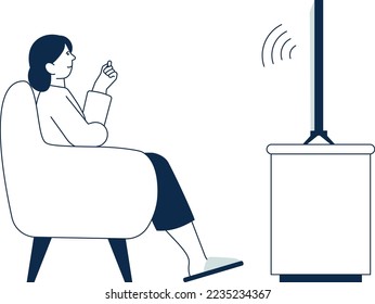 Woman sit on armchair and watching tv side view