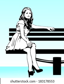 woman siting on a bench smiling