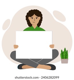 A woman sits cross-legged and holds a large white sheet with space for text. Advertising, poster, information, announcement.