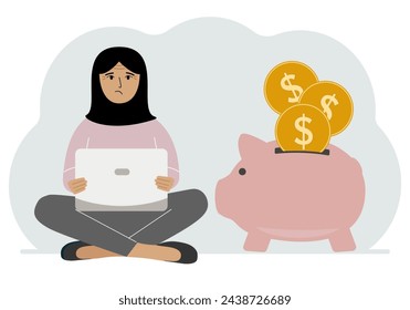 A woman sits cross-legged with a laptop next to a pig piggy bank. Earning money, saving, saving money.