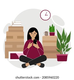 A woman sits cross-legged with a mobile phone, orders delivery, there are many things around in cardboard boxes. The woman is preparing to move to another home. Vector flat illustration.