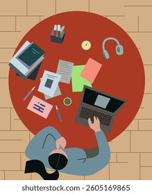 woman sits at desk table